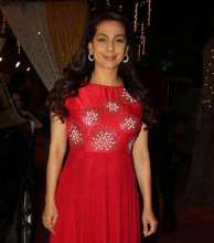 Actress Juhi Chawla in earrings by Yoube Jewellery for a music launch